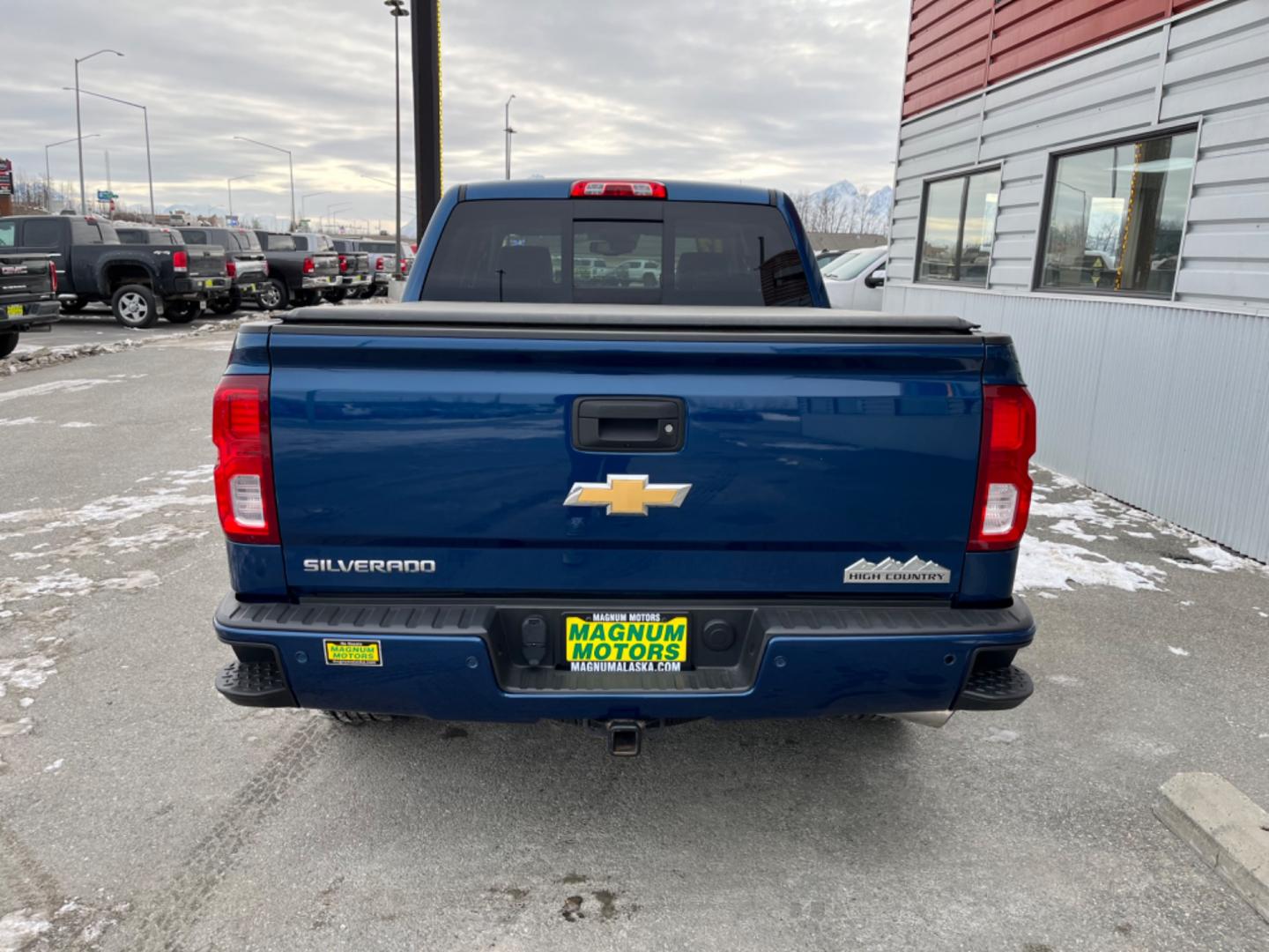 2017 Blue /black leather Chevrolet Silverado 1500 High Country Crew Cab Short Box 4WD (3GCUKTEJ2HG) with an 6.2L V8 OHV 16V engine, 6A transmission, located at 1960 Industrial Drive, Wasilla, 99654, (907) 274-2277, 61.573475, -149.400146 - Photo#3